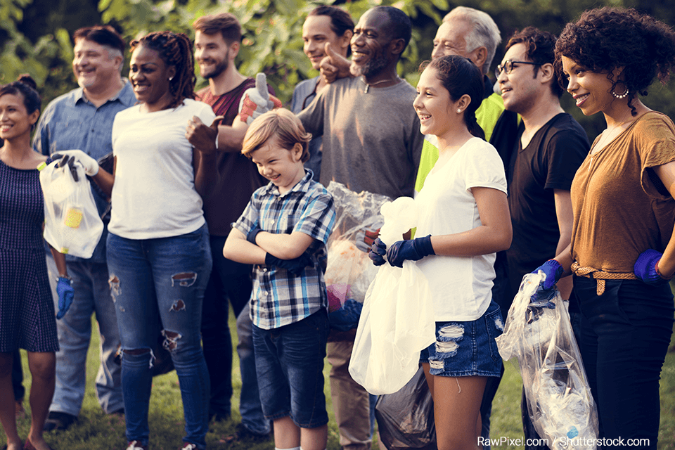 Group of volunteers with trash bags